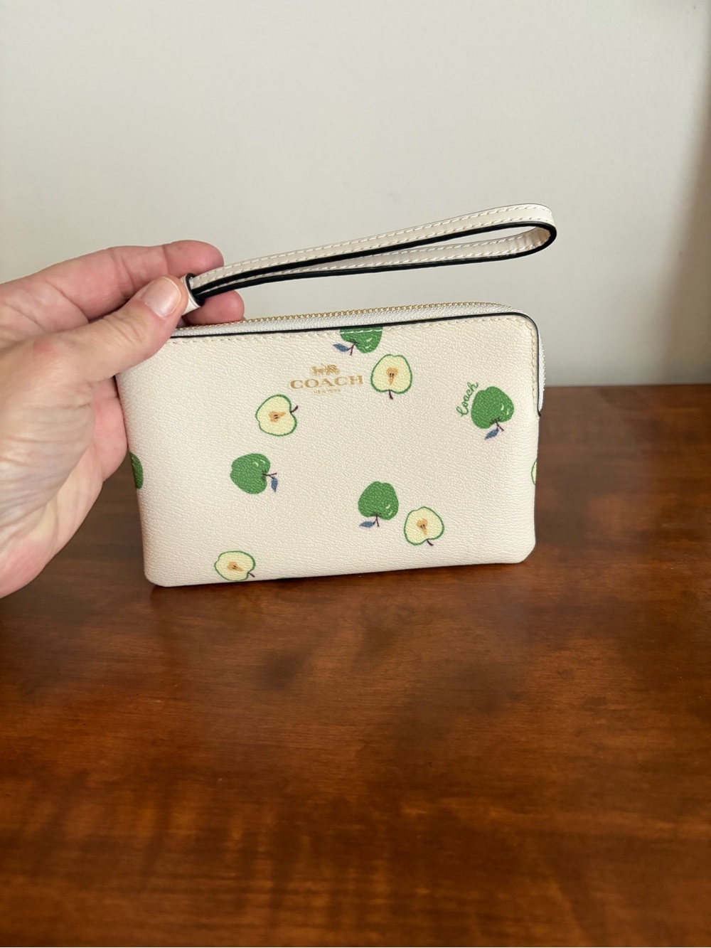 Coach Cream Wristlet with Green Apple Motif